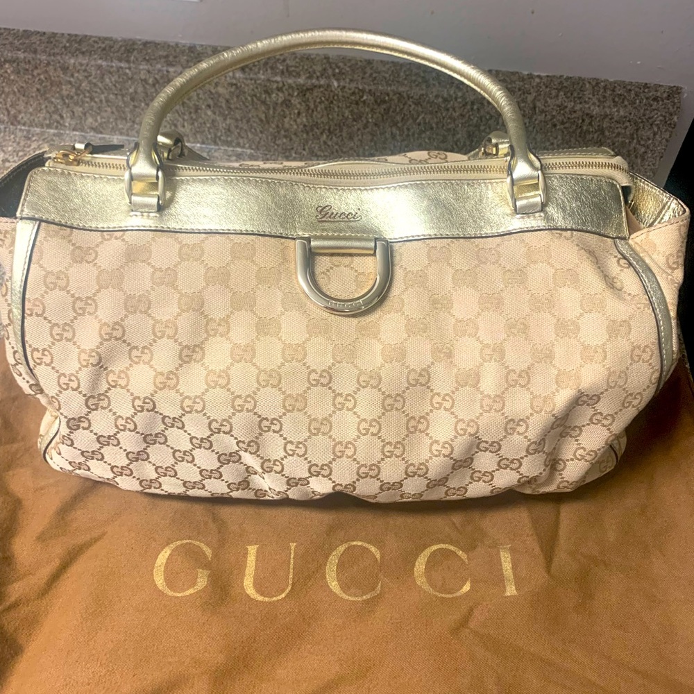Authentic Gucci leather and canvas large D ring tote.